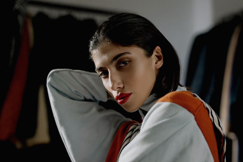 Headshot of a Woman Wearing Red Lipstick